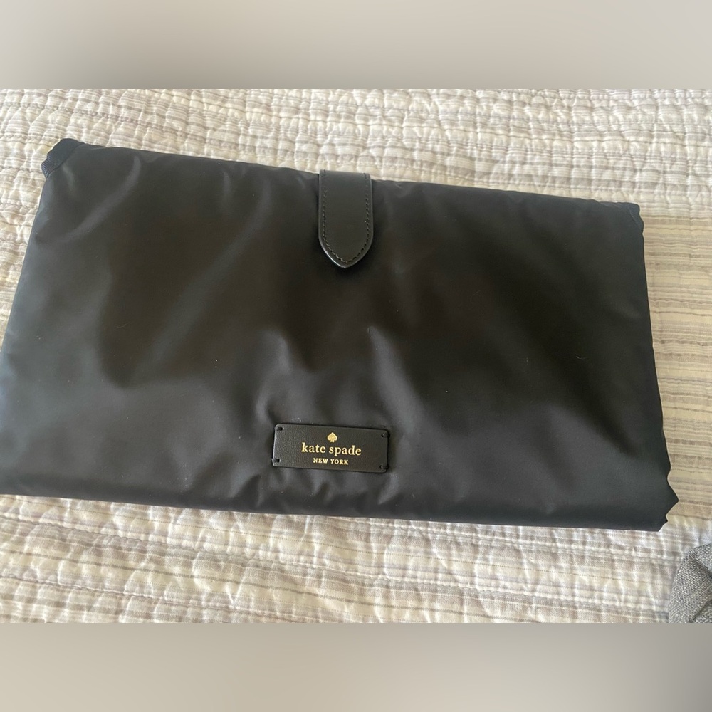 Kate Spade diaper changing pad with side pouches